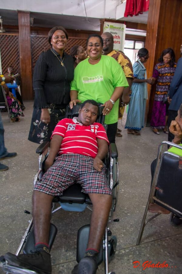 Co-Founders of Benola Cerebral Palsy Initiative, Mrs Alaba Gbadebo with a happy beneficiary of a CP Wheelchair at Benola's 7th National Cerebral Palsy Family Forum held at Hall 36, Lagos University Teaching Hospital (LUTH) recently