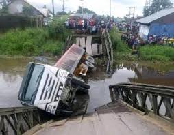 Truck destroys Bridge
