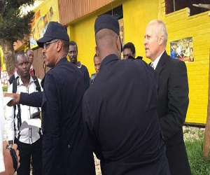 Gregg Schoof, right, was arrested in Kigali as he talked to journalists