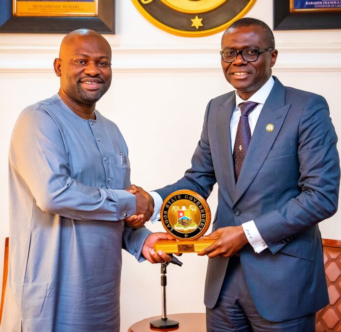 Chairman, Ijegun-Egba Tank Farm Owners and Operators Association, Mr Adebowale Olujimi (left), being presented with a plaque by the Lagos State Governor, Mr Babajide Sanwo-Olu during a courtesy visit by the members of the Association to the Governor at Lagos House, Alausa, on Monday, October 14, 2019