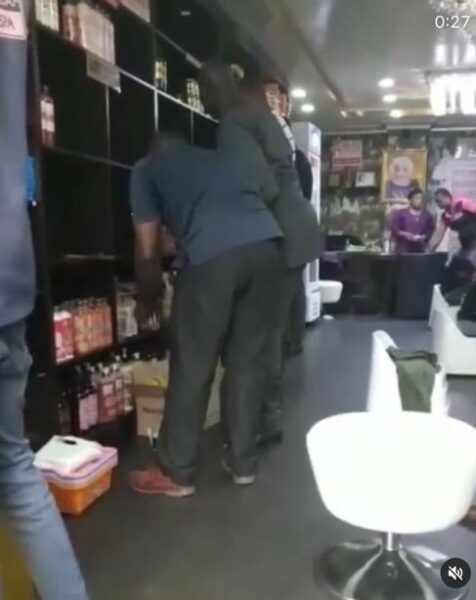NAFDAC officials sealing off the outlet