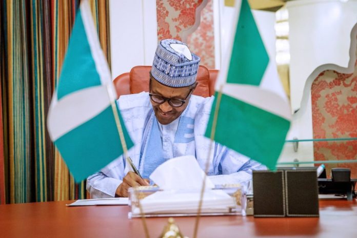 buhari-signs-1170x780