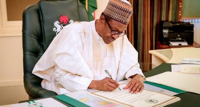 Buhari-signs-Fertiliser-Act-696x375-1