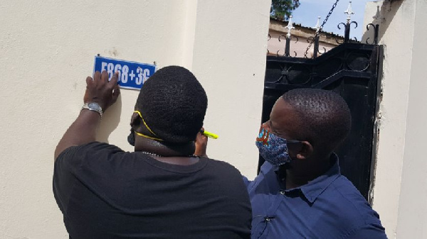 Bakary Suso (L) and Alieu Sowe, (R) are putting up the signs themselves Bakary Suso (L) and Alieu Sowe, (R) are putting up the signs themselves