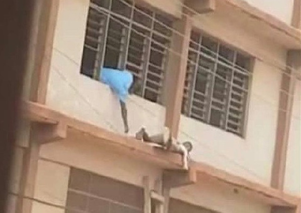 ‘Spiderman’ Sneaks WASSCE Answers To Students On Top Floor With Ladder
