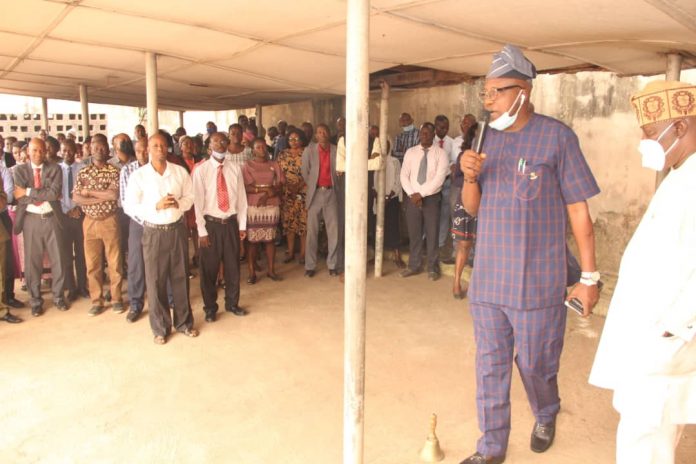 Dr. Adeniran adderessing staff members