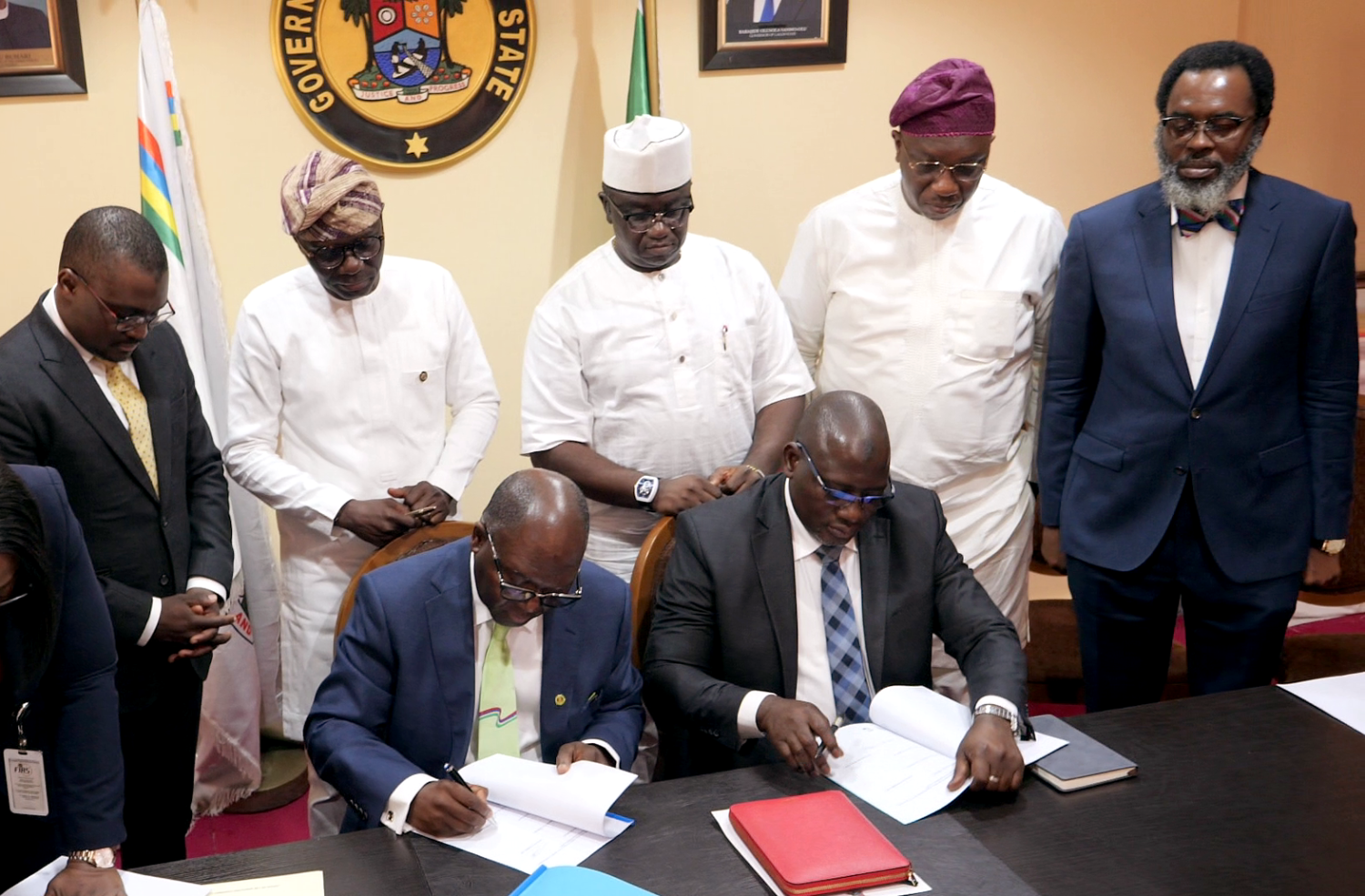 2 L-R: Executive Chairman, LIRS, Mr Ayodele Subair, Executive Chairman, FIRS, Muhammad Mamman Nami signing the MoU documents on Collaboration of Exchange of Information and Implementation of Joint Tax Audit and Investigation Exercises with (standing) Lagos State Commissioner for Finance, Dr Rabiu Olowo Onaolapo, Lagos State Governor, Babajide Sanwo-Olu, Minister of State for Finance, Budget and National Planning, Mr Clement Agba, Lagos State Commissioner for Economic Planning and Budget, Hon. Sam Egube and Lagos state Attorney-General & Commissioner for Justice, Mr Moyosore Onigbanjo SAN looking on at the Lagos State House, Marina on Monday, February 6, 2023
