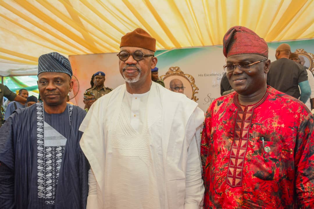 Ogun State Governor, Prince Dapo Abiodun, flanked by the outgone HoS, Dr Nafiu Aigoro (left) and the new HoS, Mr Peter Fagbohun