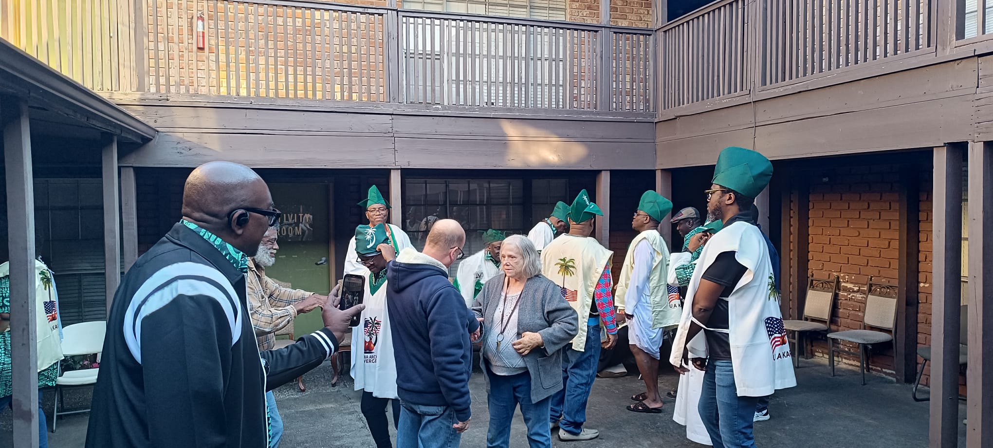 Members of the Americana Archaivar Plus Convergence gyrating with residents of the Old People's Home