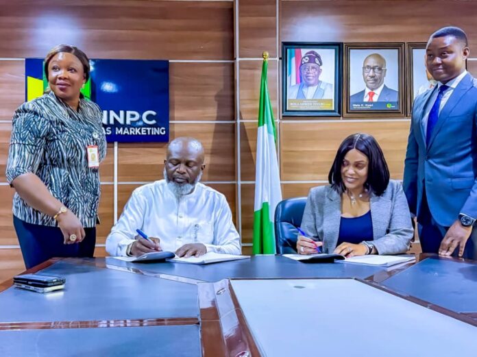 Managing Director, NNPC Gas Marketing Limited (NGML), Justin Ezeala and CEO of Ssonic Petroleum Ltd, Ifeoma Douglas, sign an 80mscf Gas Supply Agreement between the two companies for the proposed LNG Plant in Lekki Free Trade Zone, Lagos, on Thursday. Managing Director, NNPC Gas Marketing Limited (NGML), Justin Ezeala and CEO of Ssonic Petroleum Ltd, Ifeoma Douglas, sign an 80mscf Gas Supply Agreement between the two companies for the proposed LNG Plant in Lekki Free Trade Zone, Lagos, on Thursday.